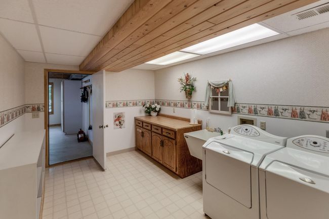 Lower level laundry room. | Image 36