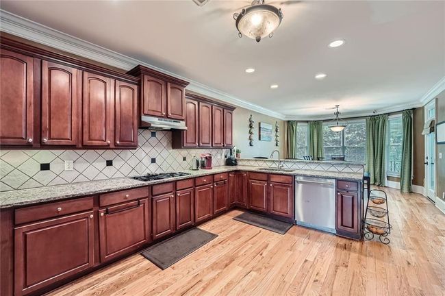 1025 Ector Dr Nw, House other with 7 bedrooms, 6 bathrooms and null parking in Kennesaw GA | Image 9
