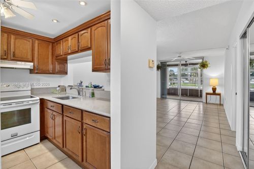 203-9090 Lime Bay Blvd, Tamarac, FL, 33321-8633 | Card Image