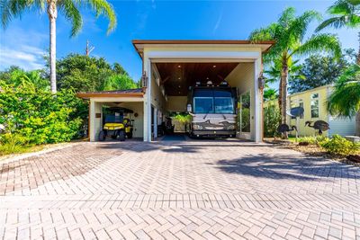 Luxury RV Port in popular clothing optional RV Resort in Pasco County: "The Nudist Capital of the World!" Extra wide paver parking pad goes all the way to the sidewalk and street. | Image 1