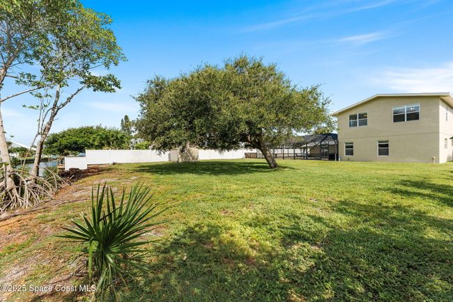 Plenty of room for Gazebo or fire pit to sit out and enjoy this spacious yard and waterfront views. | Image 45