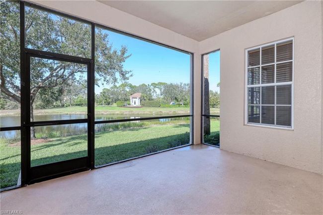 Unfurnished sunroom with a water view | Image 40