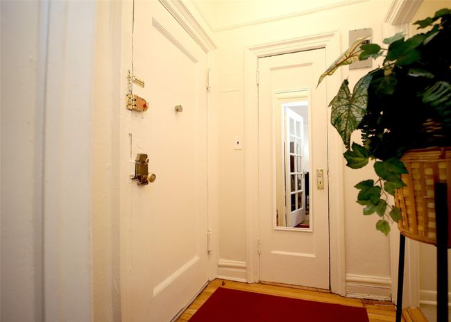 Doorway featuring light wood-type flooring | Image 17