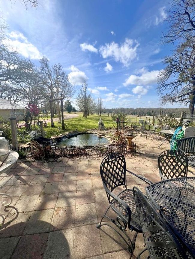 View of patio / terrace with a pool | Image 23