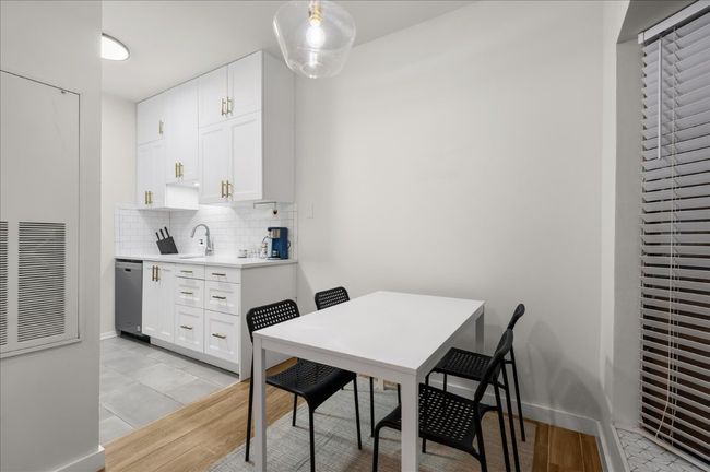 Dining area featuring light wood finished floors | Image 11