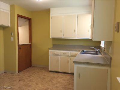 Kitchen featuring sink | Image 3