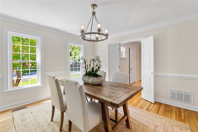 Another view of the Dining room looking toward the foyer and front of the home. | Image 10