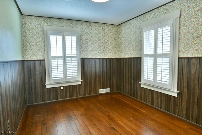 Empty room with dark hardwood / wood-style flooring | Image 26