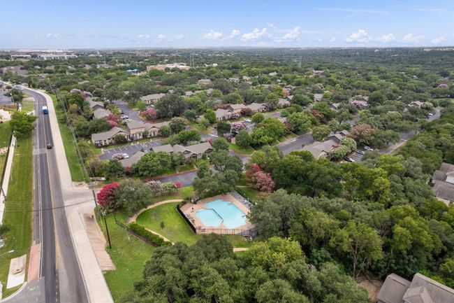 Aerial view of residential area featuring a pool | Image 34