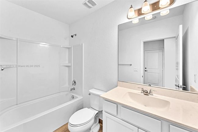 2033 Sw Castinet Ln, House other with 4 bedrooms, 3 bathrooms and null parking in Port St. Lucie FL | Image 28