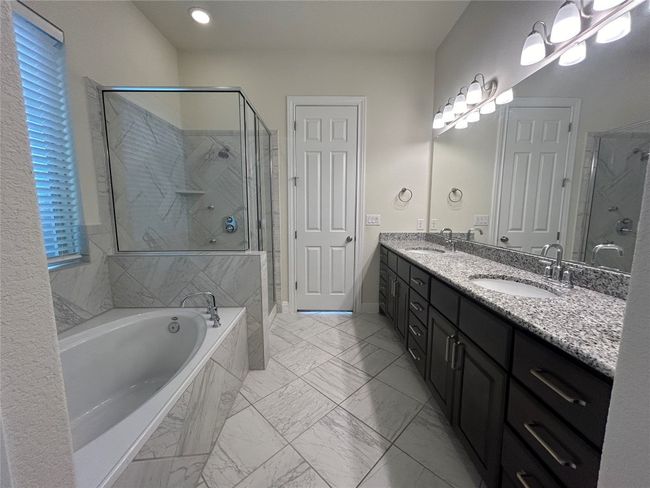Primary bathroom with soaking tub and separate shower | Image 7