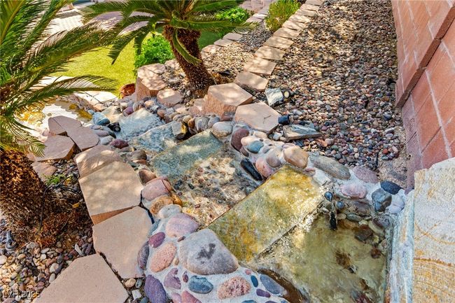 Exterior view of a small pond | Image 41