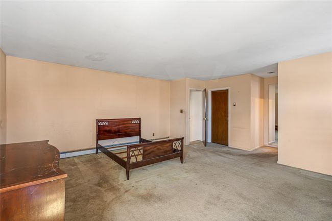 Bedroom with carpet floors | Image 16