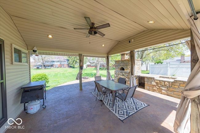view of covered patio with lights and a ceiling fan | Image 9