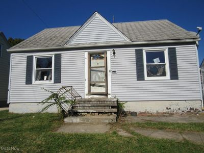 View of bungalow-style house | Image 1