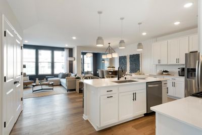 Wide open modern floorplan creates a memorable and striking home from any angle! Photo of model home. | Image 2