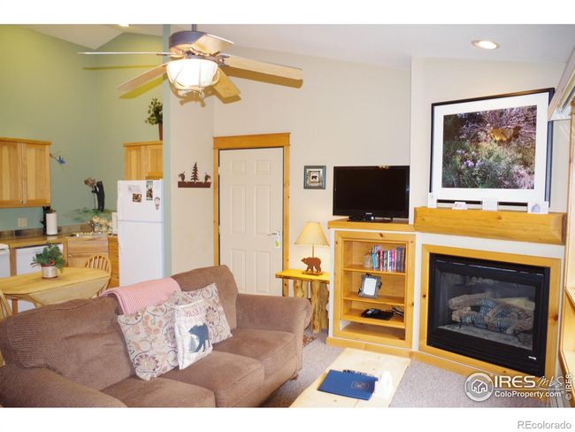 Comfortable living room with natural gas fireplace | Image 6