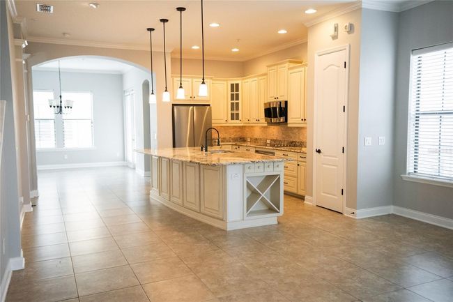 Second floor main living, kitchen, and dining. | Image 16