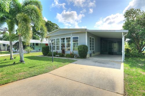 710 Hyacinth Cir, Barefoot Bay, FL, 32976-7665 | Card Image