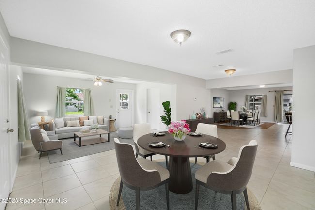 Virtual staged Living room & dining area. | Image 11