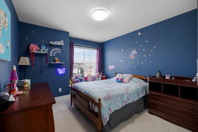 Bedroom featuring carpet floors | Image 22