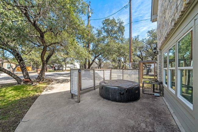 View of patio with a hot tub | Image 31