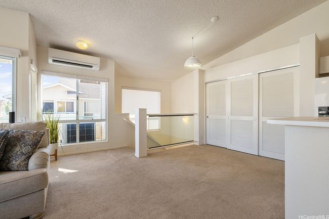 Private entryway staircase leads to the second floor, one level living. | Image 8