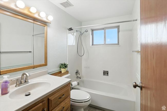 Main bathroom featuring shower combination and vanity | Image 16