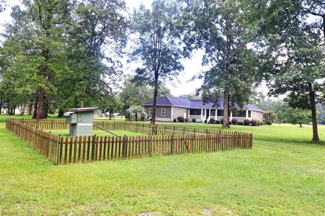 View of fenced yard | Image 22