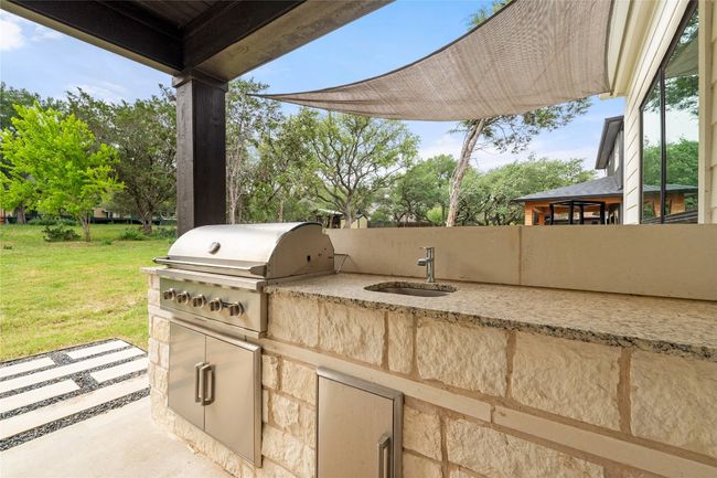 View of patio / terrace with a sink | Image 30