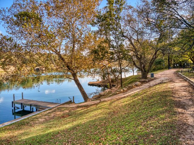 Dock area featuring a water view | Image 29