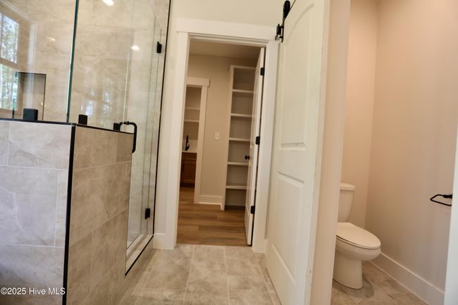 Walk-in shower, private watercloset & direct access to walk-in closet | Image 24