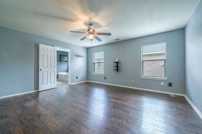 Primary bedroom located on the first floor. | Image 15