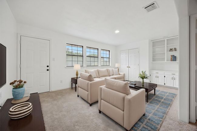 This virtually staged upstairs 3rd living area can be an additonal tv room or a playroom or an office. | Image 33
