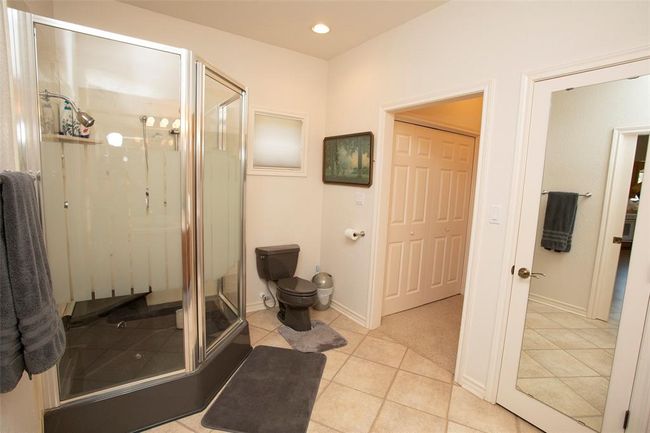 Bathroom with tile floors, dual sinks, and oversized vanity | Image 27