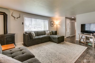 Living room with cozy gas fireplace | Image 2