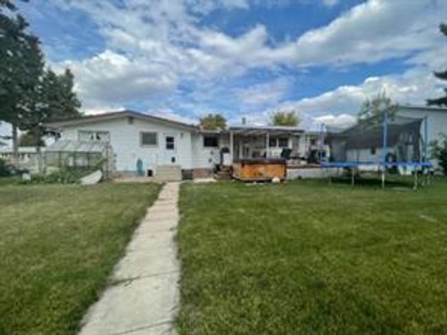 909 10 Ave, House detached with 5 bedrooms, 3 bathrooms and 4 parking in Wainwright AB | Image 49