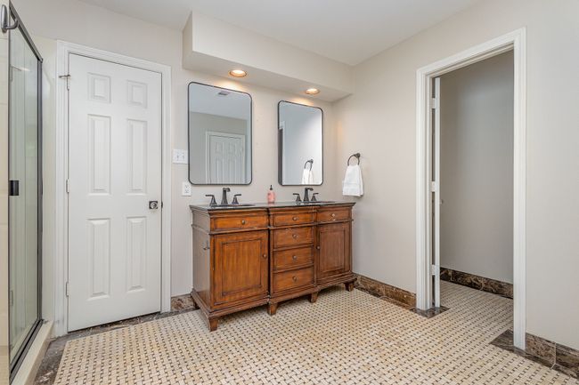 Primary bathroom with double vanity, linen closet, water closet | Image 20