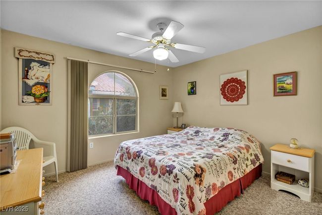 Bedroom featuring baseboards, carpet floors, and ceiling fan | Image 35
