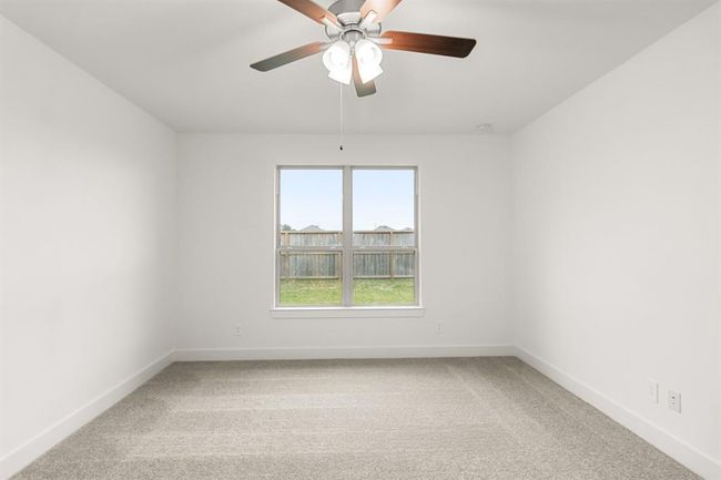 Step into your serene sanctuary—the primary bedroom of your dreams, nestled in stunning new construction. | Image 14