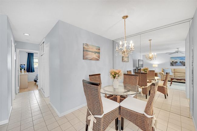 Big Custom Mirror in Your Dining Area. From Your Living Room and Dining Area is the Bathroom and Both Bedrooms. Being Sold Furnished and Turn-Key! | Image 41