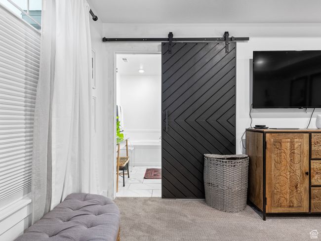 Bedroom with a barn door | Image 20