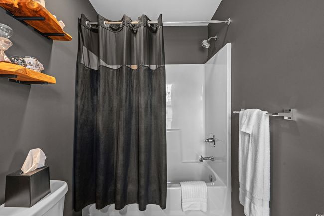 Full bath featuring shower / bath combo and toilet | Image 29