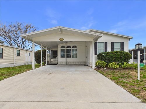 573 Dolphin Cir, Barefoot Bay, FL, 32976-2595 | Card Image