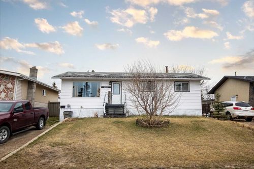 9244 110 Avenue, Home with 4 bedrooms, 2 bathrooms and 4 parking in Grande Prairie AB | Card Image