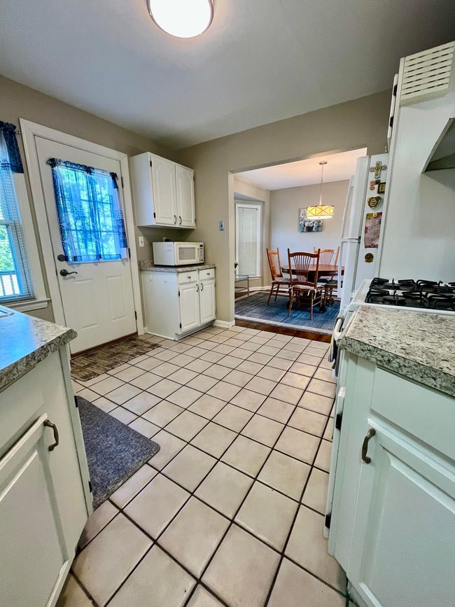 Kitchen leads to deck | Image 10