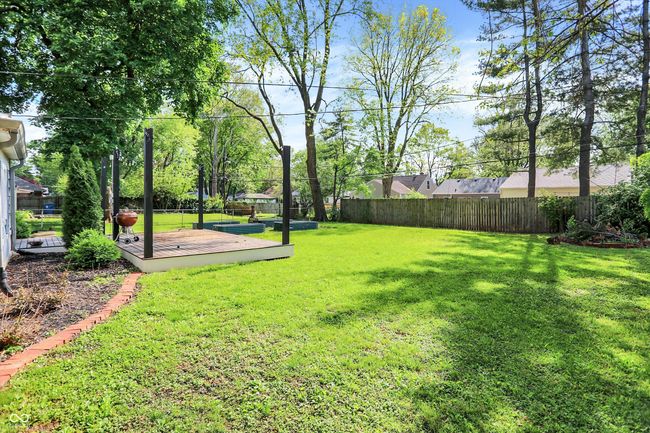 view of yard featuring a wooden deck | Image 40