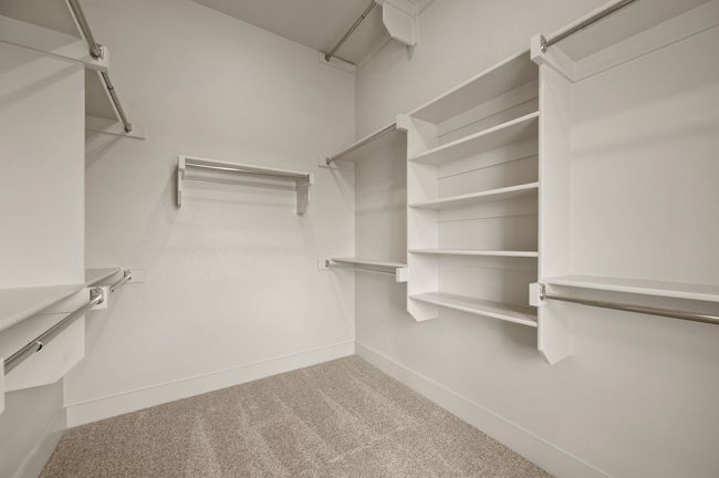 With seasonal hanging racks and ample space, your dream owner's closet awaits! | Image 14