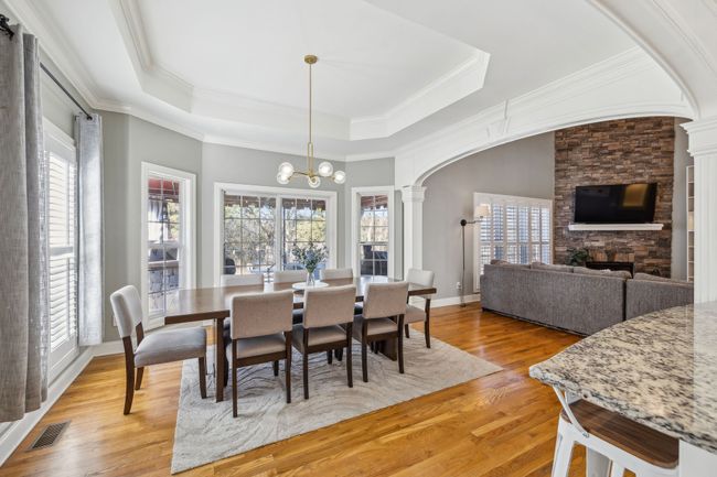 The dining area is spacious enough for a table that seats eight AND still with plenty of room to walk around. | Image 18
