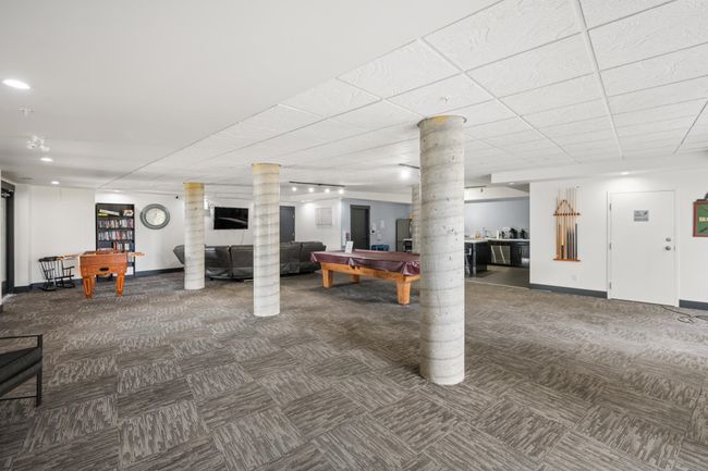 Finished basement featuring carpet flooring, billiards table, and recessed lighting | Image 33